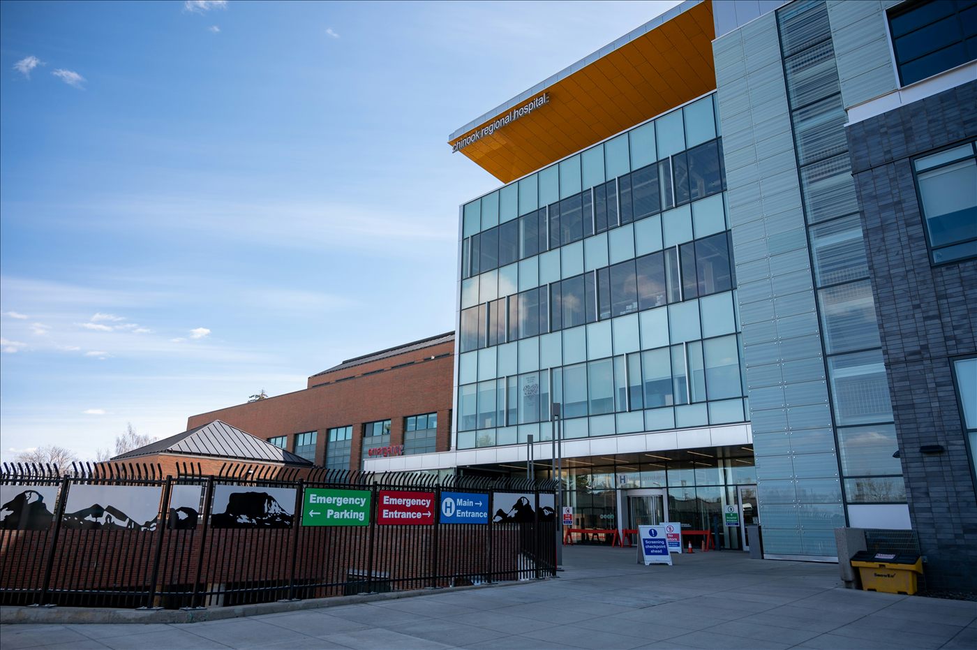 Modern hospital building exterior with main entrance